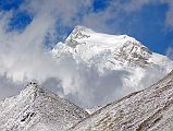 03 Shishapangma And Pungpa Ri From Ridge Above Nyalam On Trek To Taro Tso After cresting the ridge above Nyalam, Shishapangma came out of the clouds for a few minutes. The peak just below and left of the summit is Pungpa Ri (7445m).